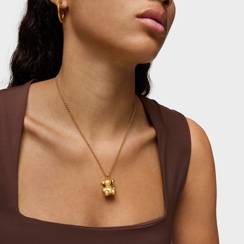 Dije oso corona con baño de oro 18 kt sobre plata y cornalinas Cachito Mío