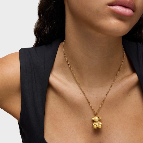 Dije oso con baño de oro 18 kt sobre plata y detalle cornalina Cachito Mío