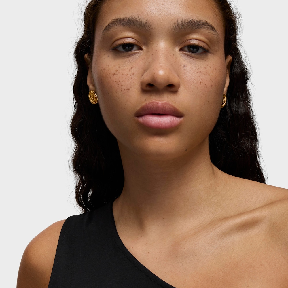 Aretes flor con ba&ntilde;o de oro 18 kt sobre plata Cachito M&iacute;o