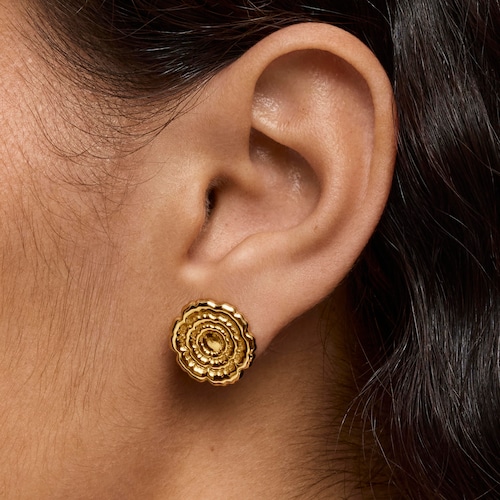 Aretes flor con baño de oro 18 kt sobre plata Cachito Mío