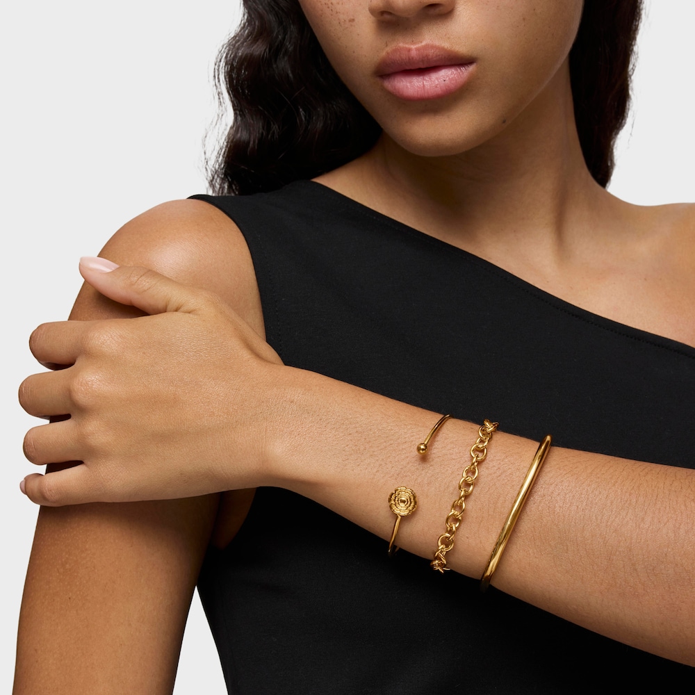 Pulsera esclava con ba&ntilde;o de oro 18 kt sobre plata y detalle flor Cachito M&iacute;o