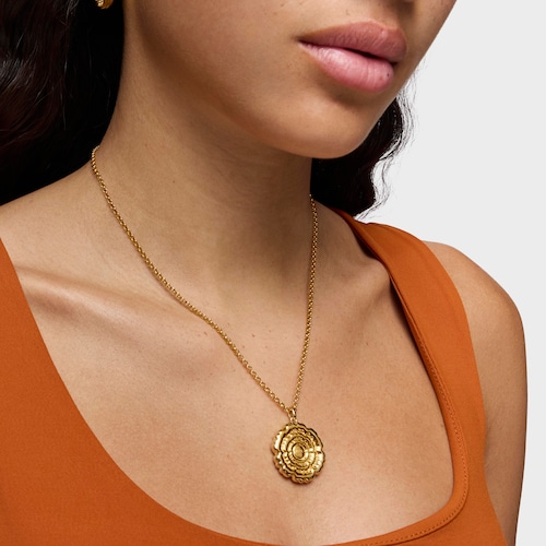 Dije flor con baño de oro 18 kt sobre plata Cachito Mío