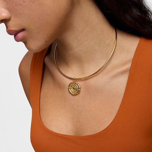 Dije flor con baño de oro 18 kt sobre plata Cachito Mío