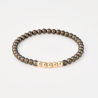 Pulsera elástica de titanio y oro TOUS ATELIER