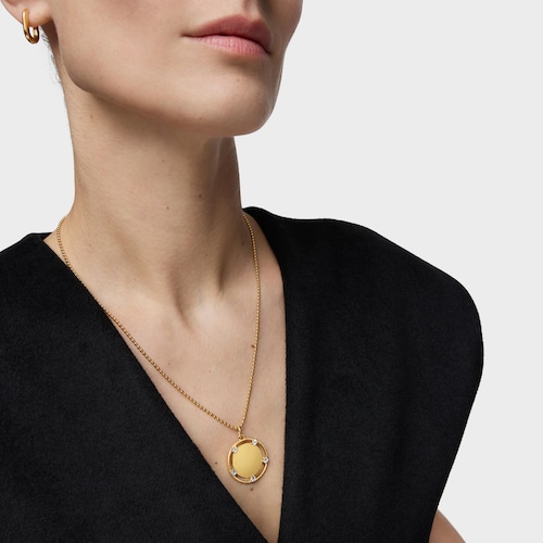 Colgante medalla con baño de oro 18 kt sobre plata y topacios TOUS Basics