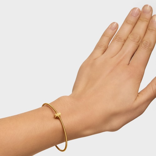 Charm TOUS Basics con baño de oro 18 kt sobre plata motivo niña 7 mm