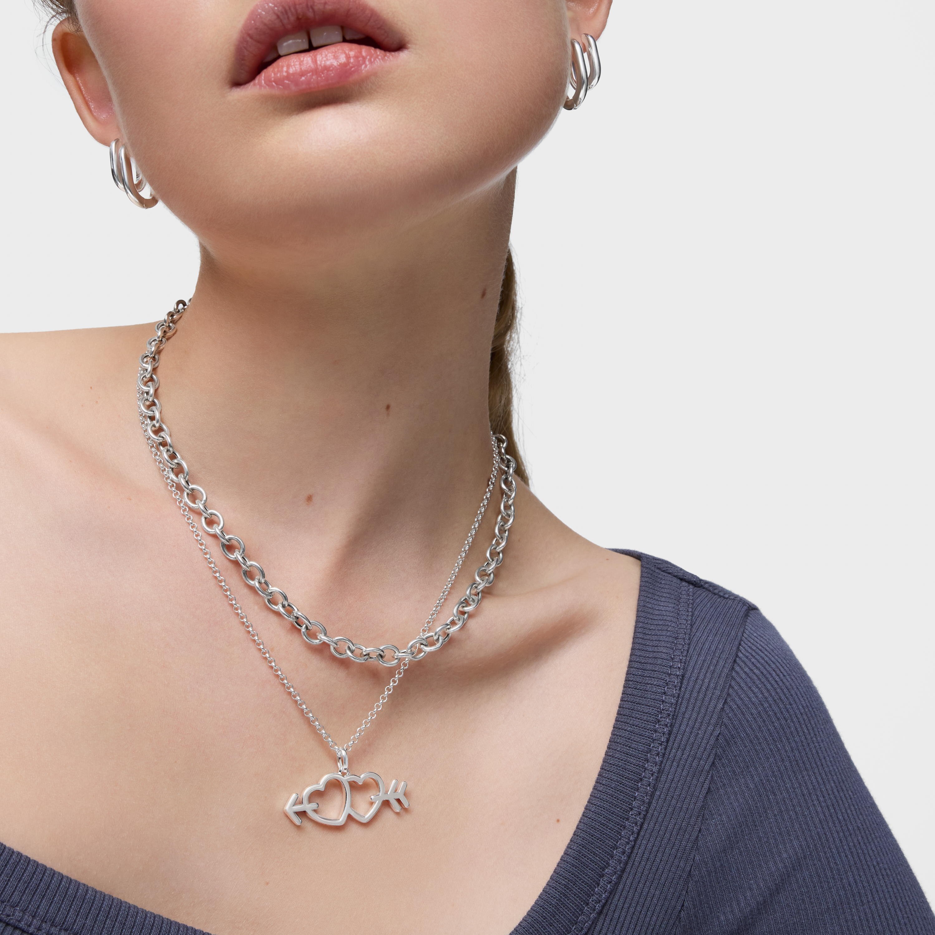 Silver pendant with arrow/heart motifs Medallions