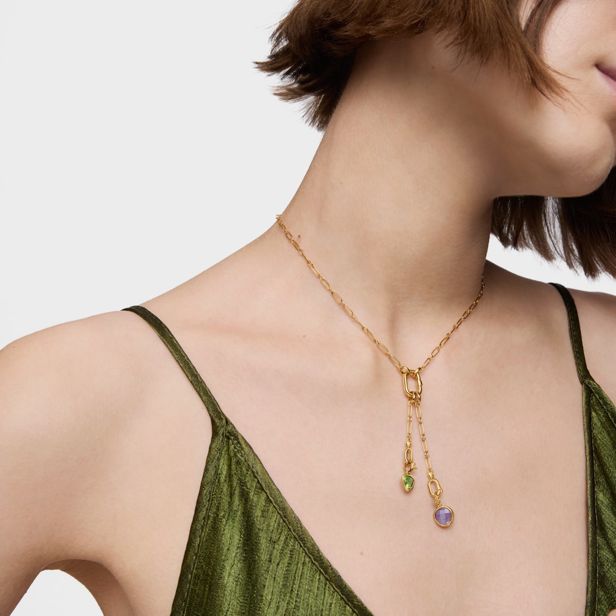 Colgante pequeño con baño de oro 18 kt sobre plata y peridoto Medallions