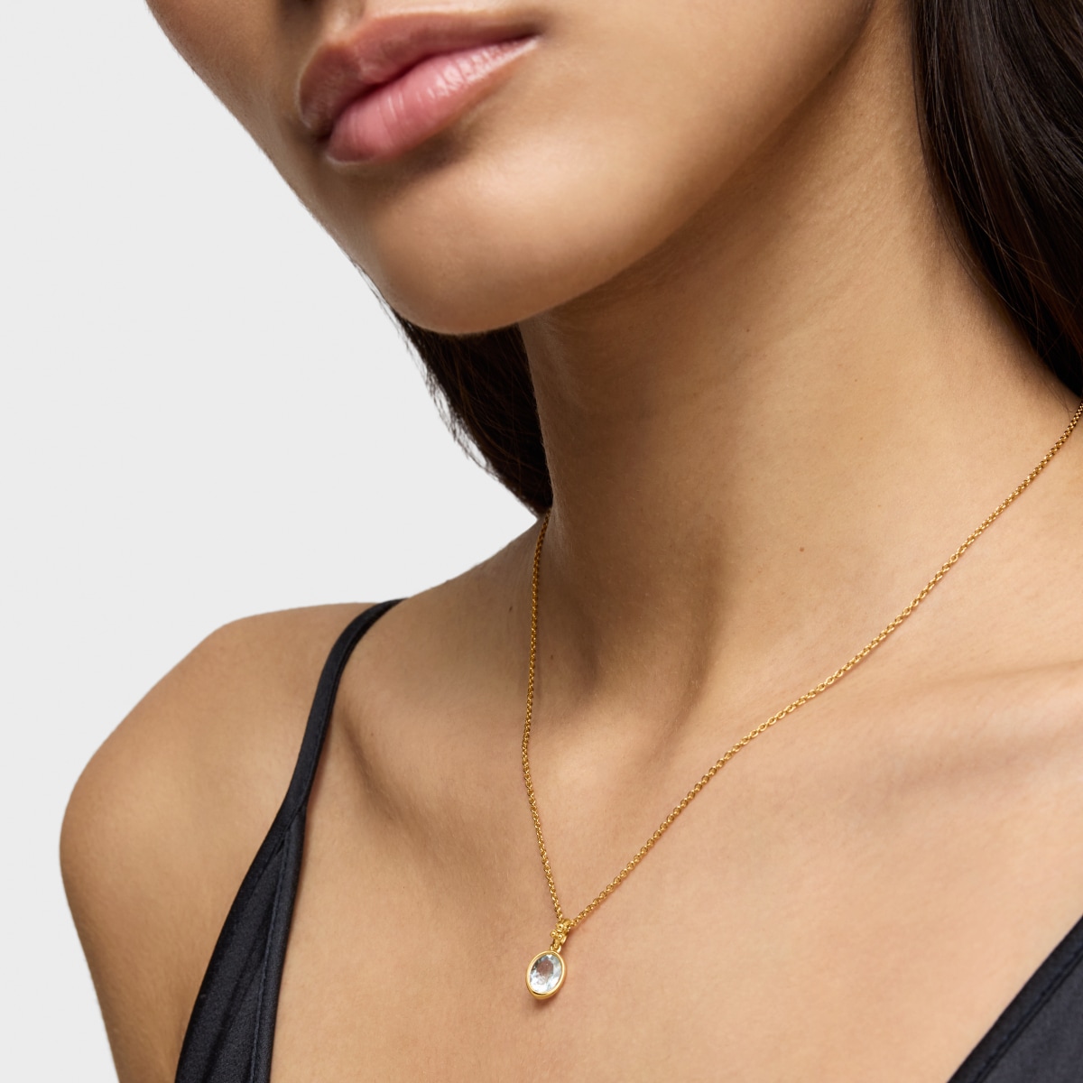 Colgante pequeño con baño de oro 18 kt sobre plata y aguamarina Medallions