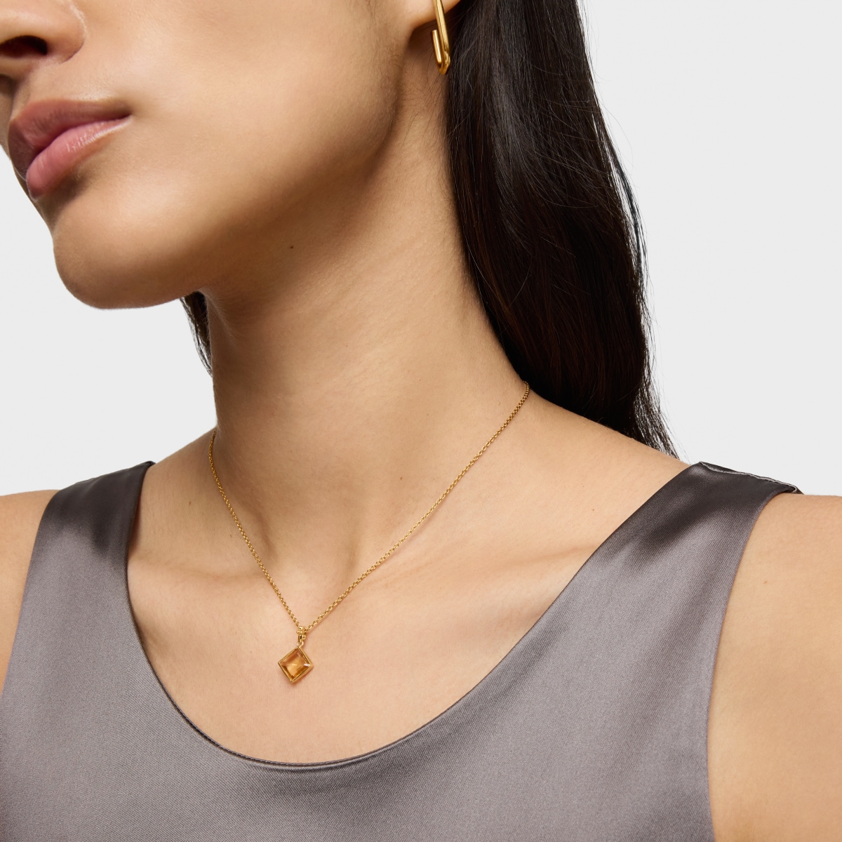 Colgante pequeño con baño de oro 18 kt sobre plata y citrino Medallions