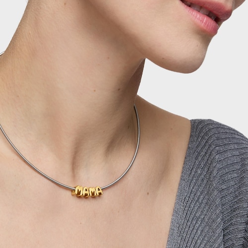 Pack collar de acero, baño de oro 18 kt sobre plata y charms TOUS Mama