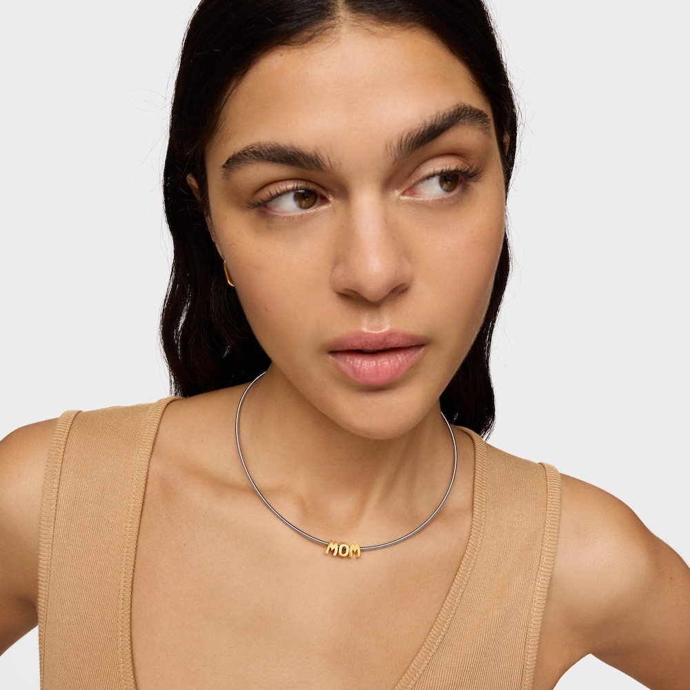 Kr&oacute;tki naszyjnik ze stali i srebra pokrytego 18-karatowym złotem TOUS Mom