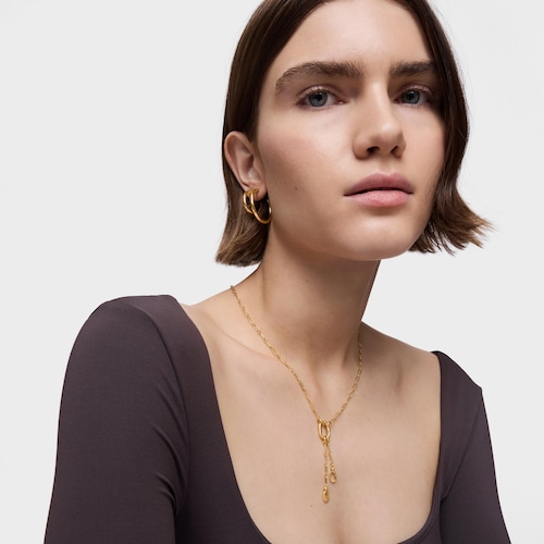 Short 18kt gold plating over silver Necklace with double pendant detail and ring Hold Oval