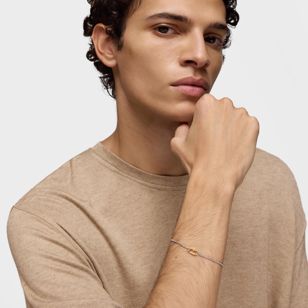 Pulsera cadena de acero y anilla de oro Hold Oval