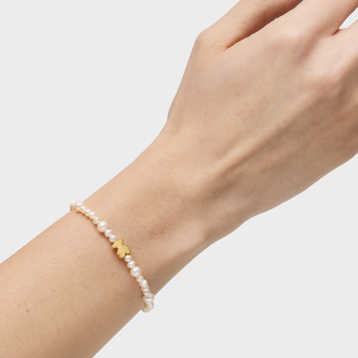 Pulsera elástica de perlas cultivadas y motivo oso de oro Sweet Dolls
