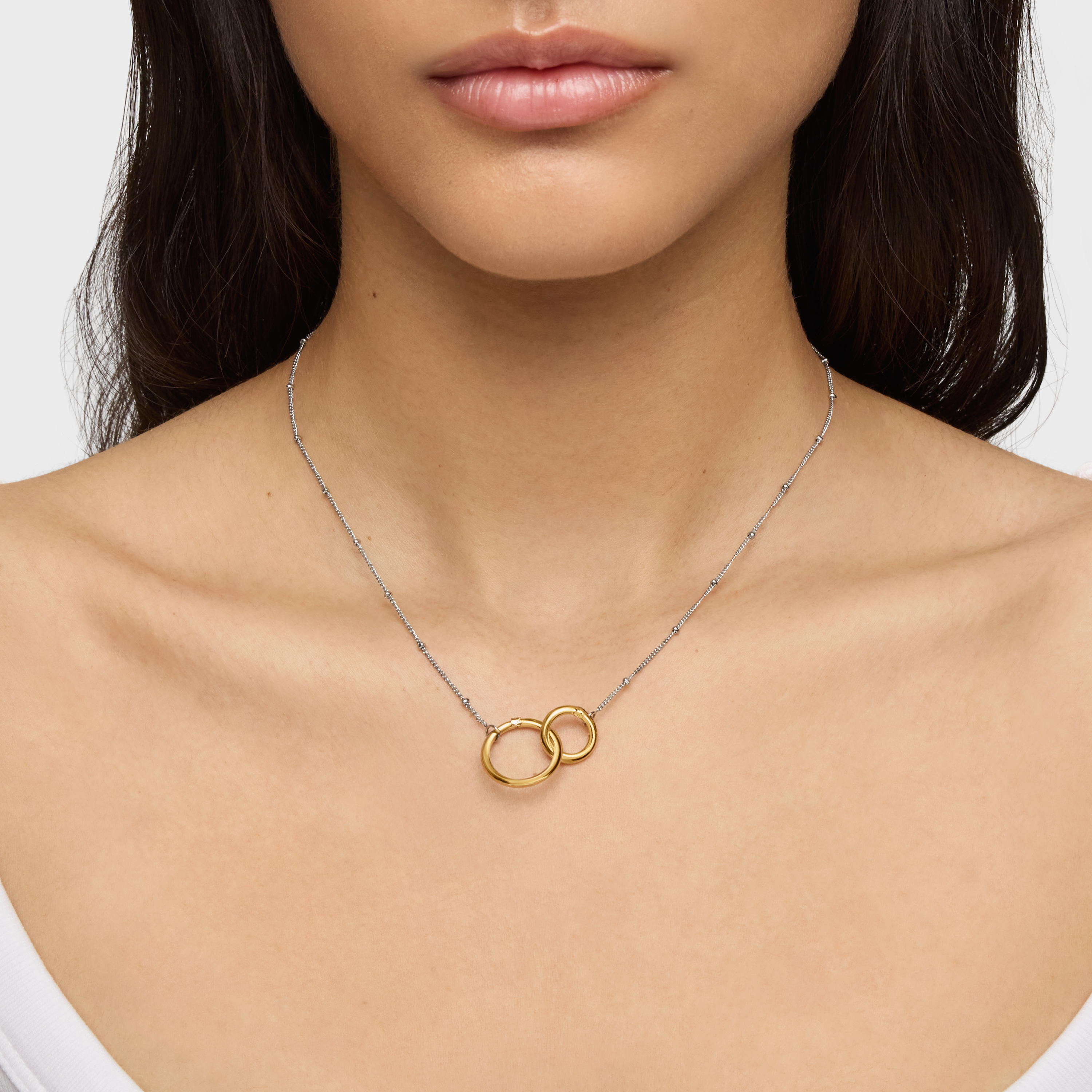 Short steel Necklace with 18K solid gold ring Hold