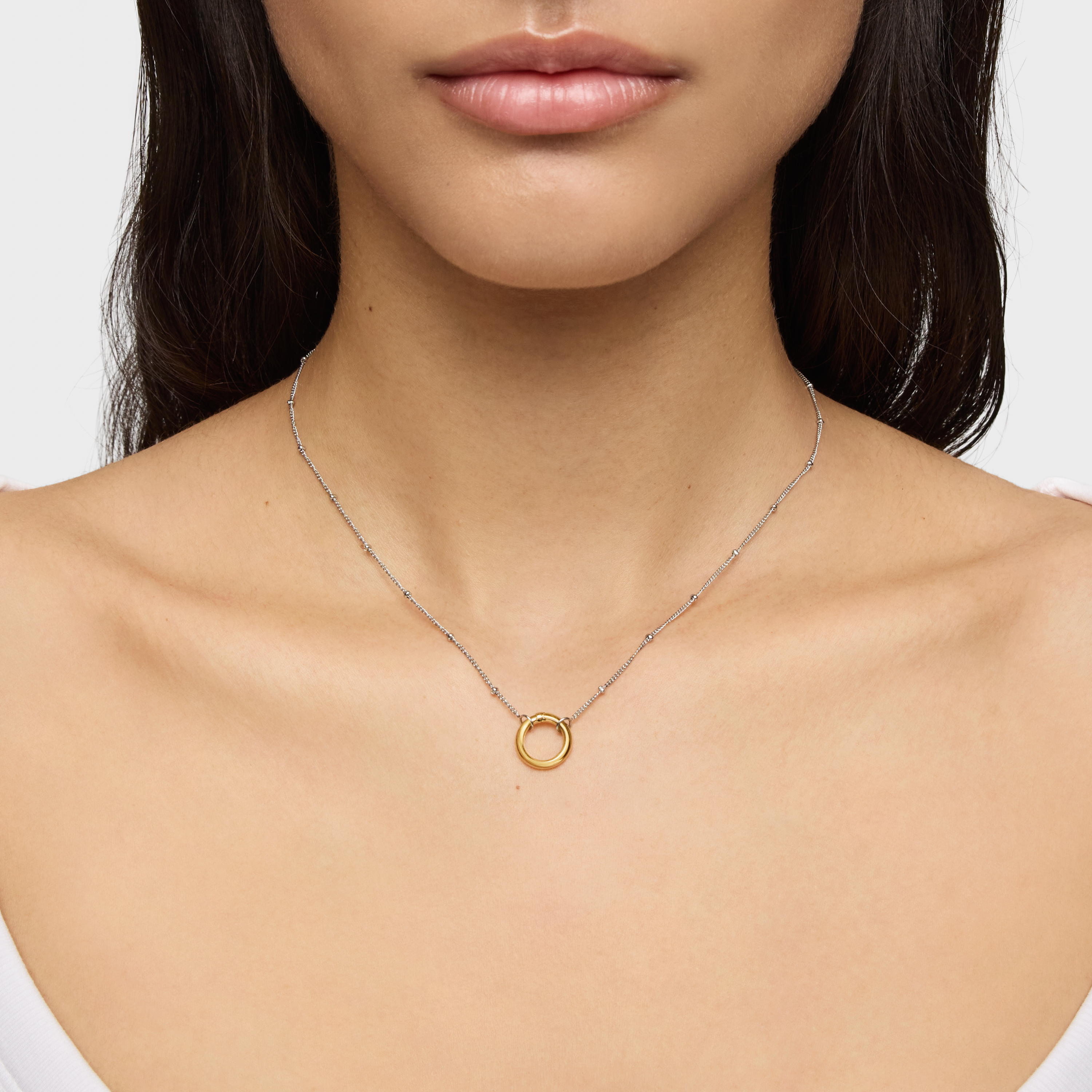 Short steel Necklace with 18K solid gold ring Hold