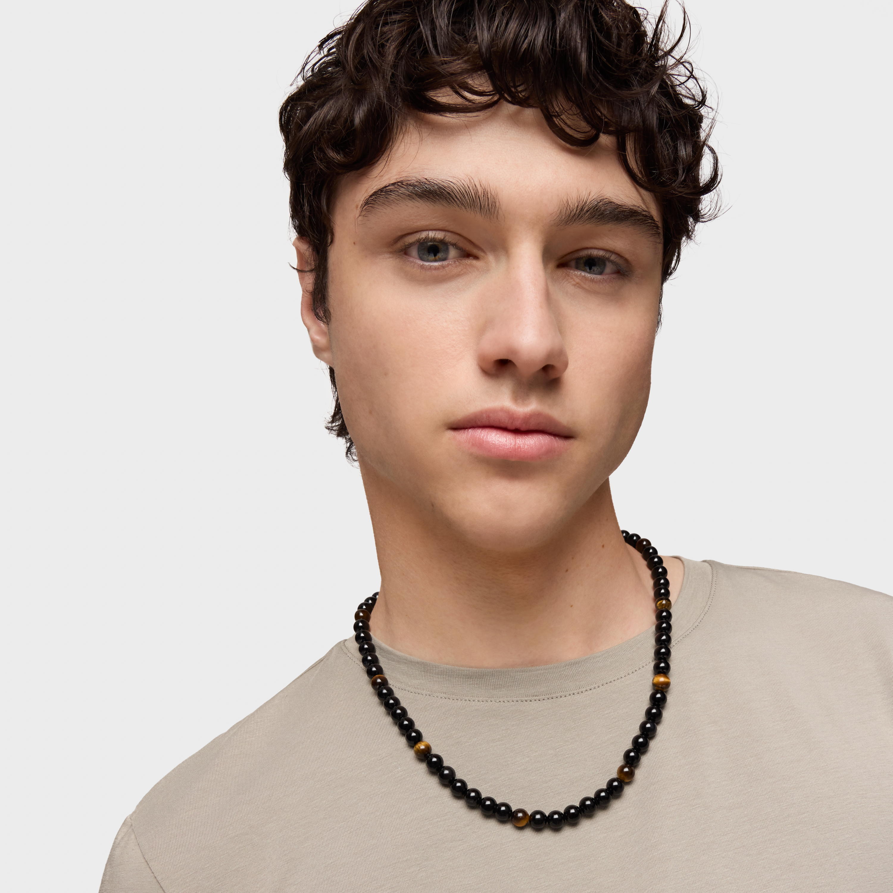 Collar de plata ónix, ojo de tigre y anillas Hold Man 