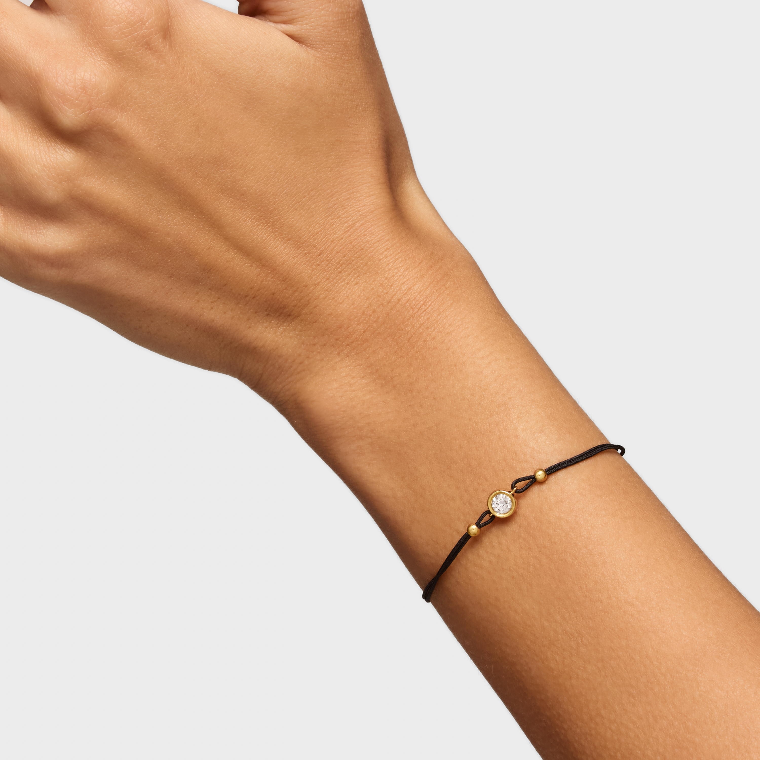 Pulsera de nylon negro con baño de oro 18 kt sobre plata y diamante creado en laboratorio Line LGD