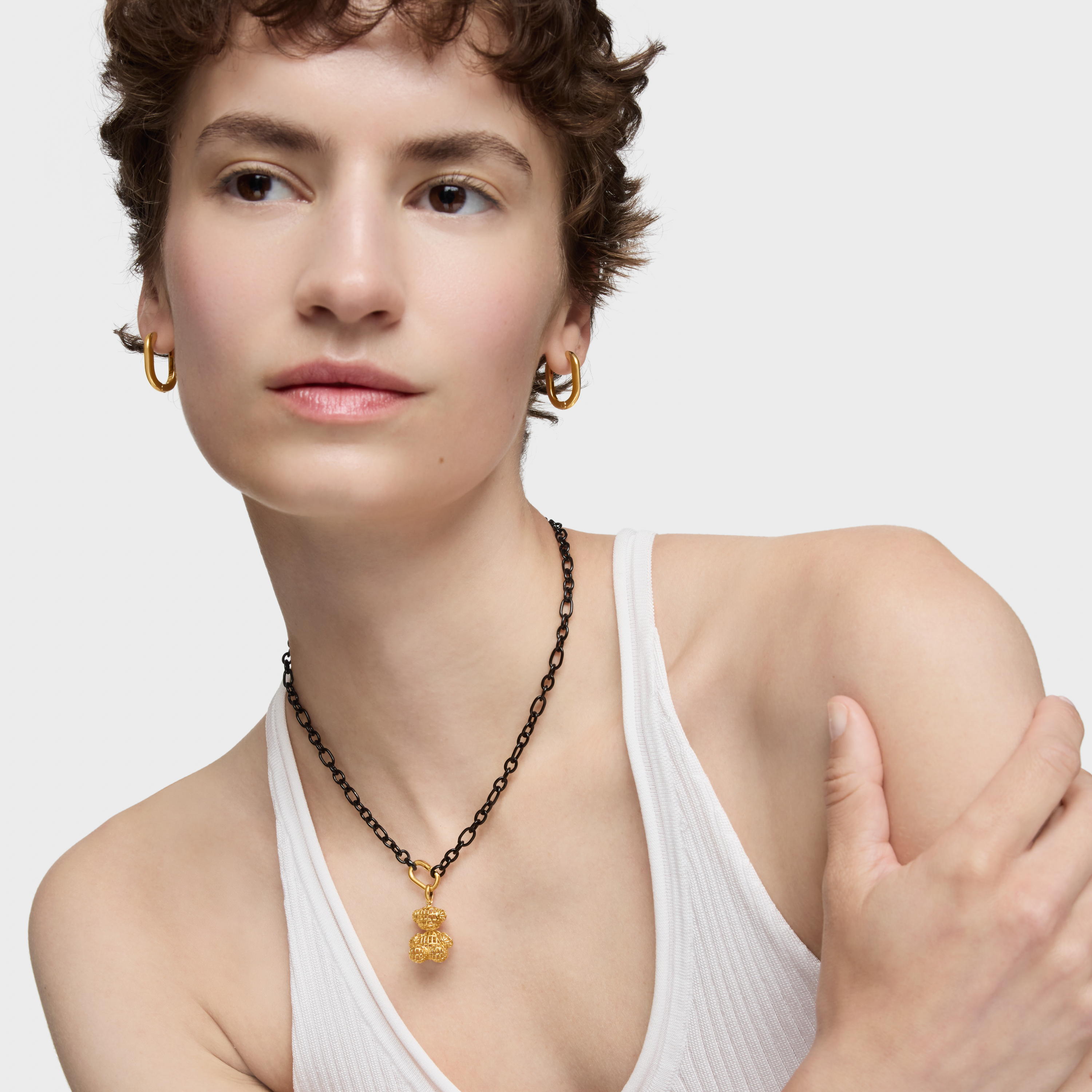 Die-cut-detail bear pendant with 18kt gold plating over silver Bold Bear