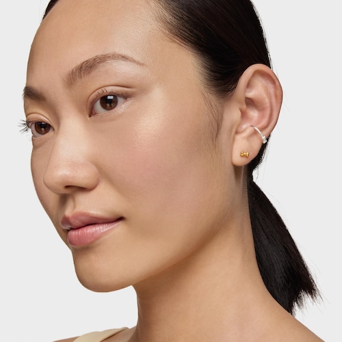 Piercing de oreja lazo de acero dorado TOUS Ribbon