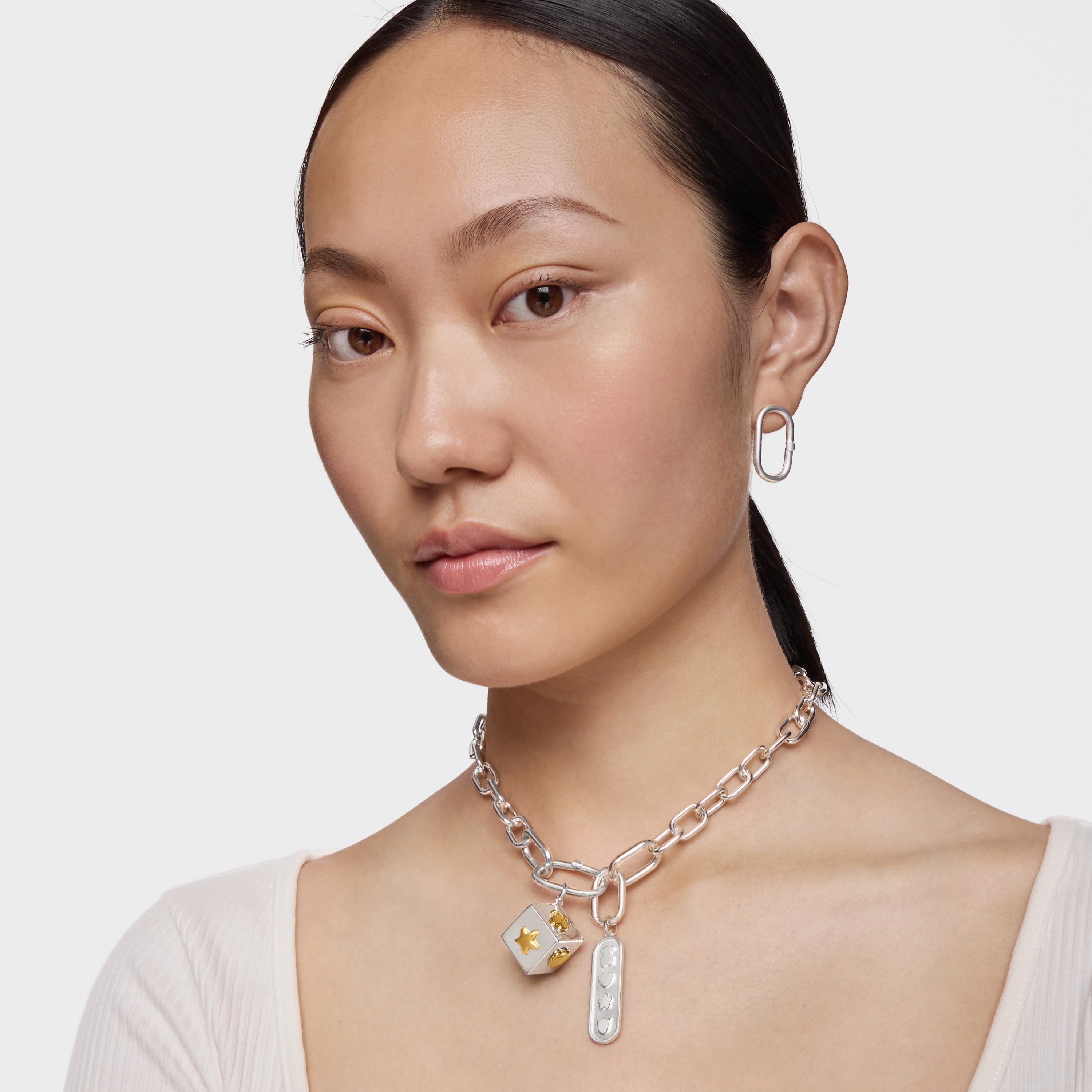 Silver pendant with motifs Medallions