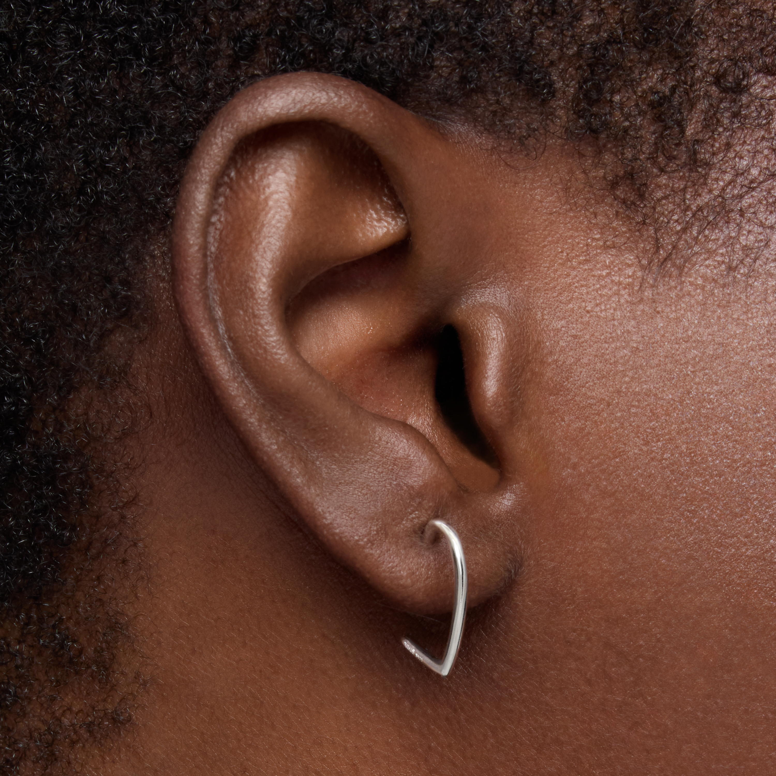 Silver Hoop earrings with heart motif New Silueta