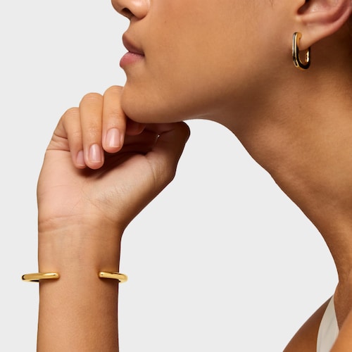 Pulsera esclava con baño de oro 18 kt sobre plata y ónix  Line