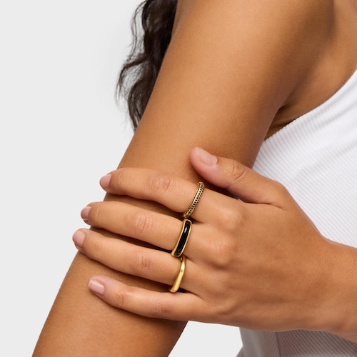 Anillo abierto con baño de oro 18 kt sobre plata y ónix Line