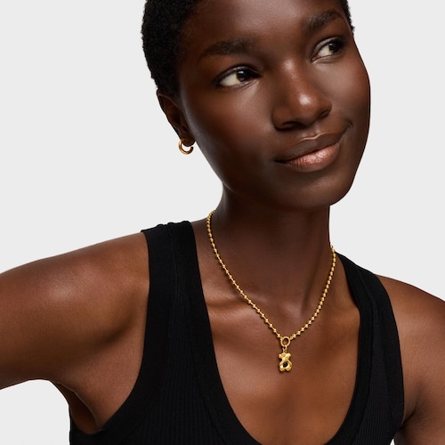 Colgante con baño de oro 18 kt sobre plata y ónix TOUS Sweet 40s