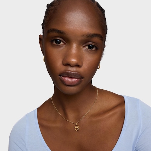 Colgante con baño de oro 18 kt sobre plata y metacrilato blanco Galaxy