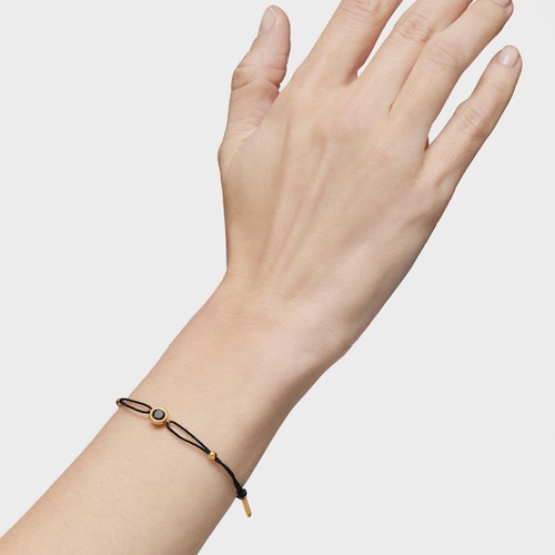 Pulsera de nylon negro con baño de oro 18 kt sobre plata y espinela negra Line
