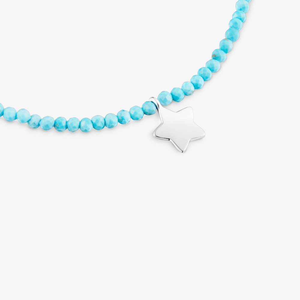 Pulsera el&aacute;stica con magnesia azul y estrella de plata TOUS Motivos