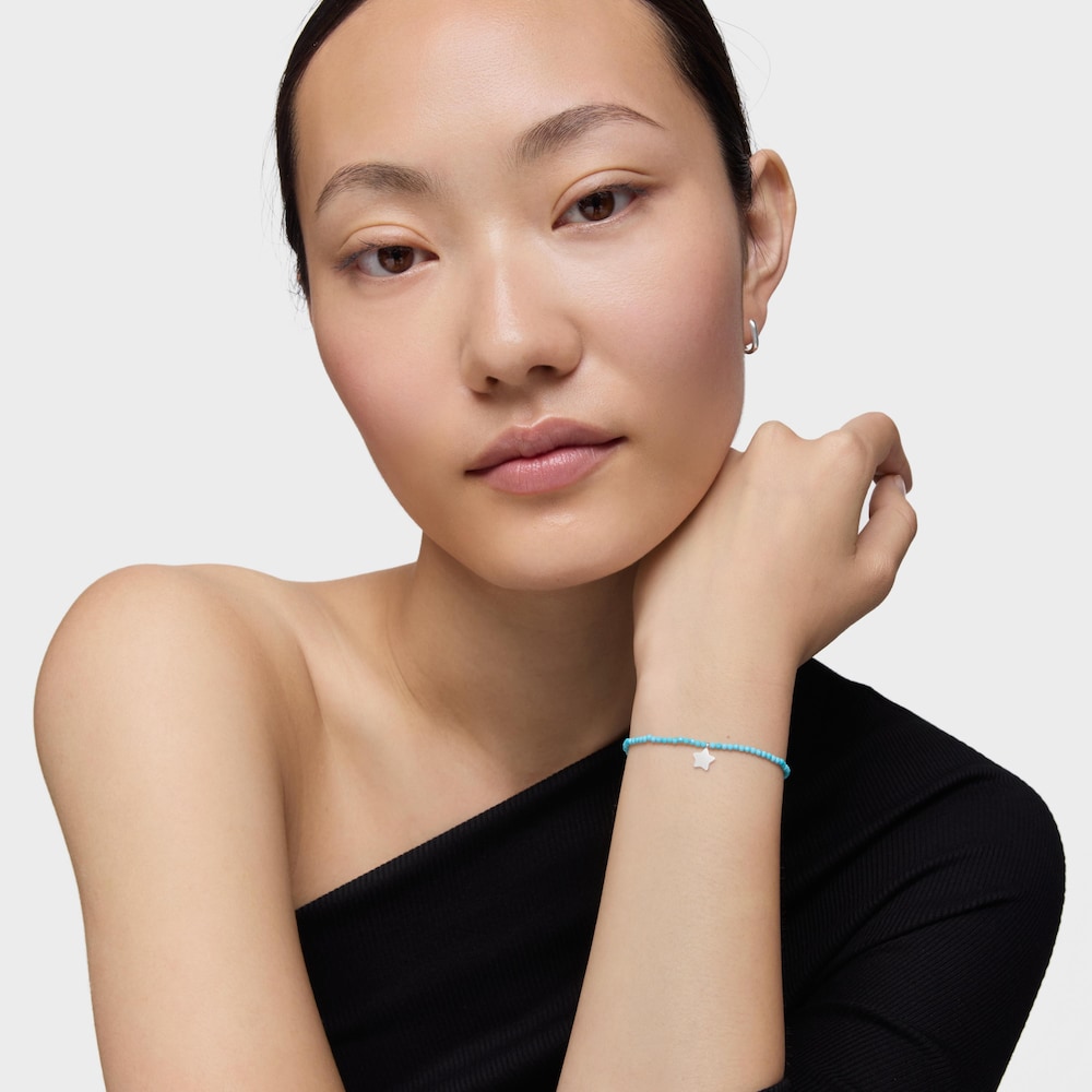 Pulsera el&aacute;stica con magnesia azul y estrella de plata TOUS Motivos