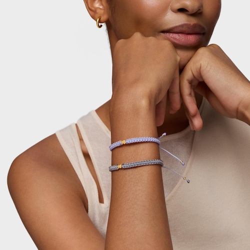 Pulsera oso con baño de oro 18 kt sobre plata y nylon malva TOUS Motivos