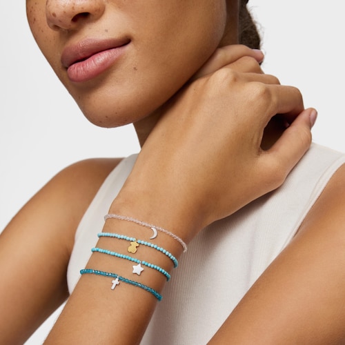 Pulsera elástica con apatito neón y cruz de plata TOUS Motivos