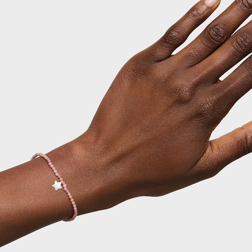 Pulsera elástica con ópalo rosa y estrella de plata TOUS Motivos