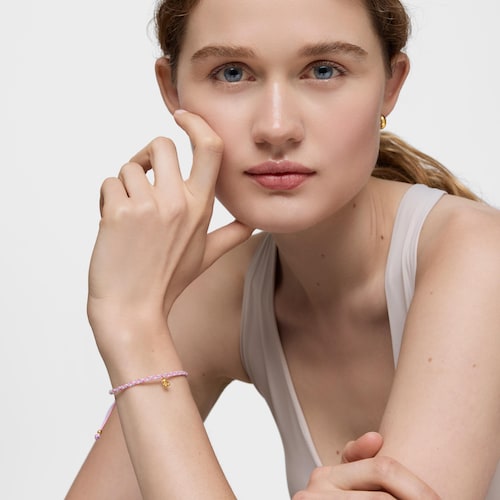 Pulsera oso con baño de oro 18 kt sobre plata y nylon rosa/blanco TOUS Motivos