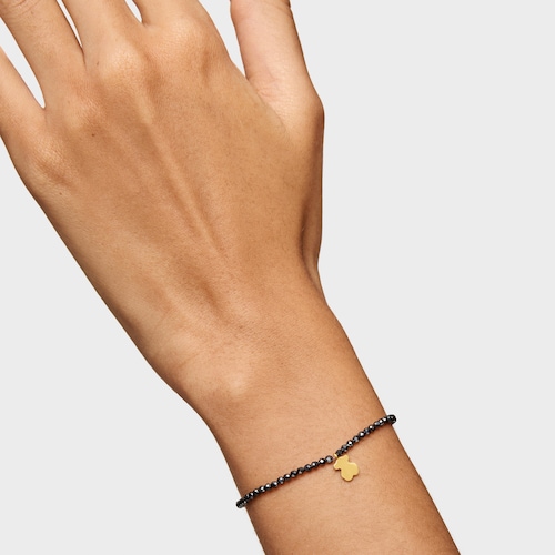 Pulsera elástica con hematita y oso con baño de oro 18 kt sobre plata TOUS Motivos