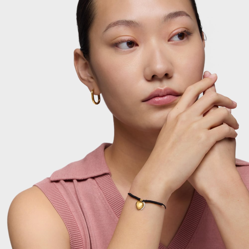 Armband aus 18&nbsp;kt vergoldetem Silber und schwarzem Nylon mit Doppelherz-Motiv TOUS Flechazo