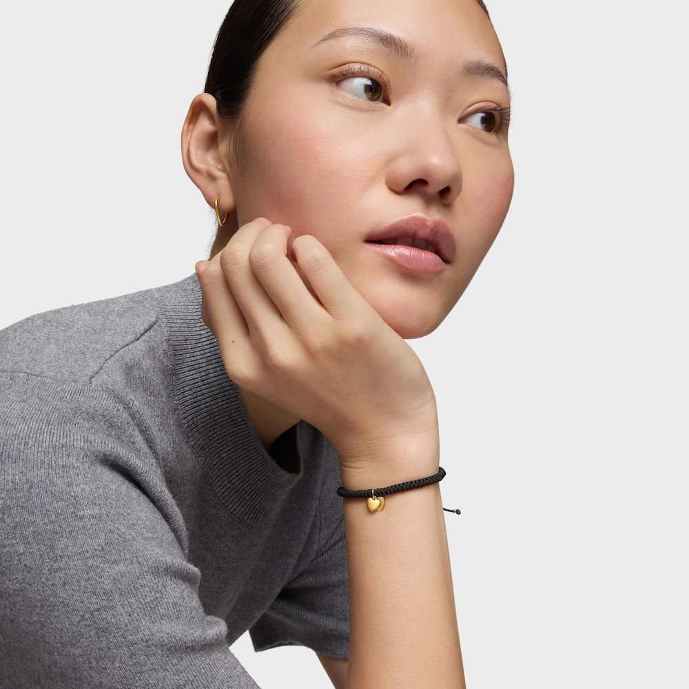 Bracelet en or 14&nbsp;ct double c&oelig;ur et nylon noir TOUS Flechazo