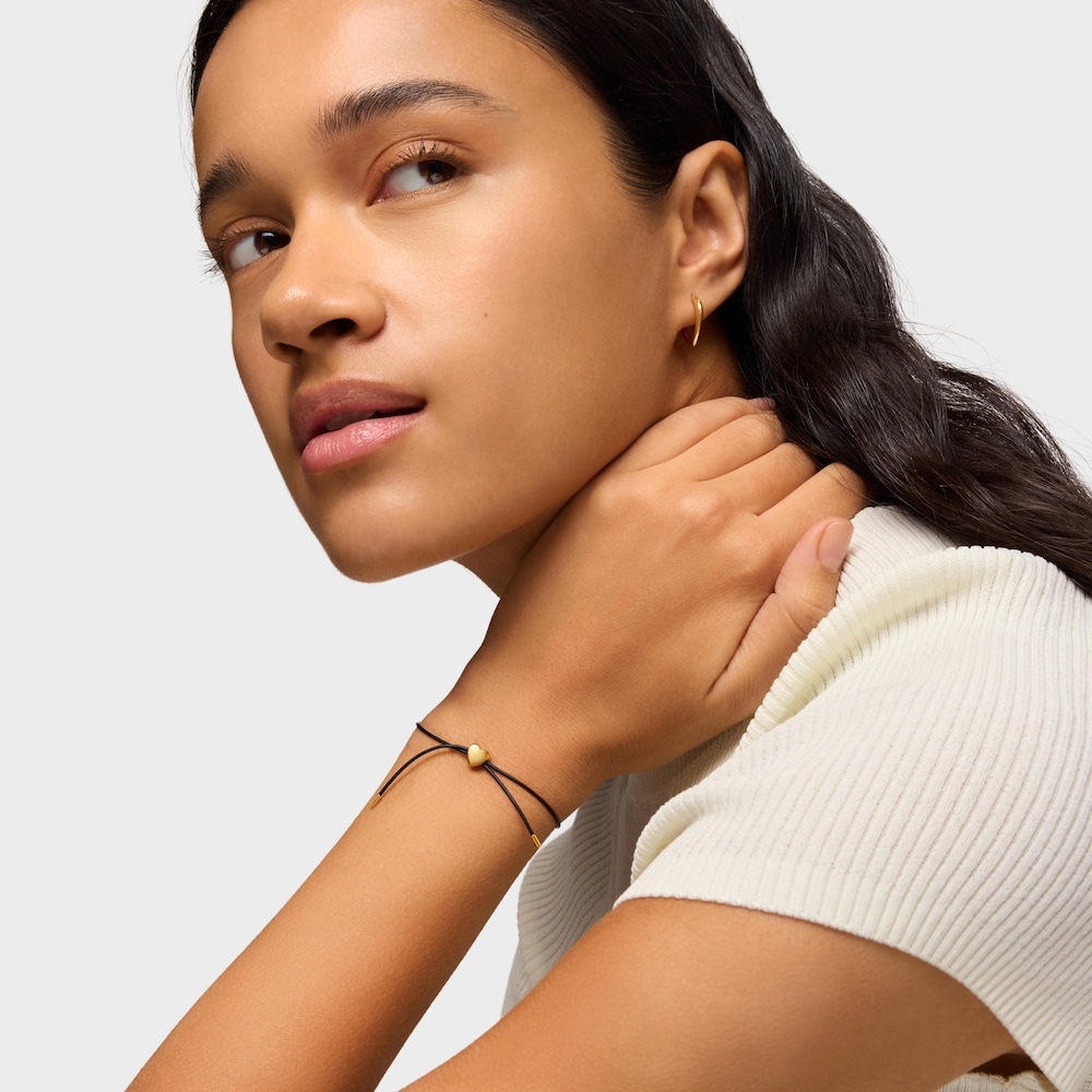 Pulsera coraz&oacute;n de oro 14 kt y caucho Bold Motif