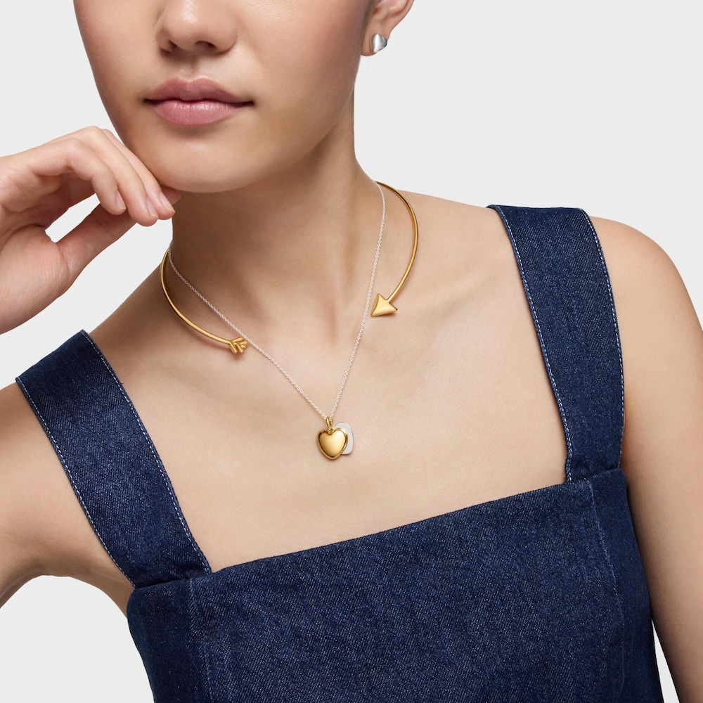 Priliehav&yacute; n&aacute;hrdeln&iacute;k s&nbsp;18&nbsp;kt pozl&aacute;ten&iacute;m na striebre TOUS Flechazo