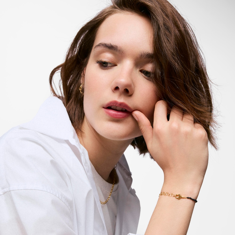 Pulsera cadena con ba&ntilde;o de oro 18 kt sobre plata y &oacute;nix TOUS MANIFESTO