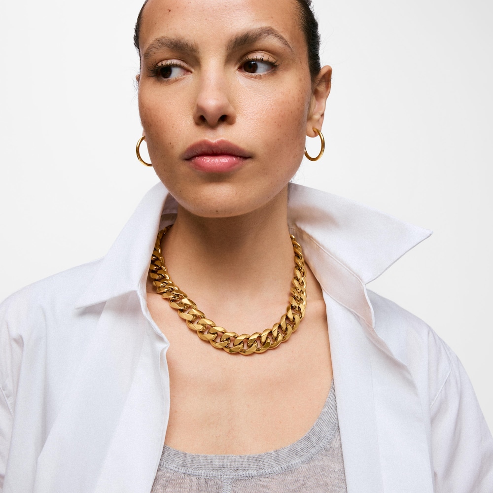 Řet&iacute;zkov&yacute; N&aacute;hrdeln&iacute;k s&nbsp;ploch&yacute;mi čl&aacute;nky z&nbsp;oceli ve zlat&eacute; barvě TOUS Basics