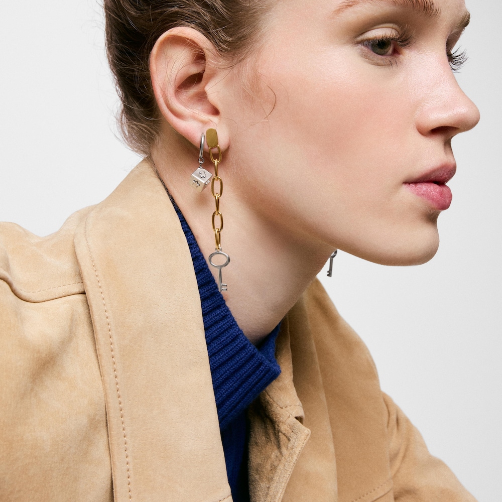 Arracades llargues d&rsquo;acer bicolor motiu clau TOUS Charming