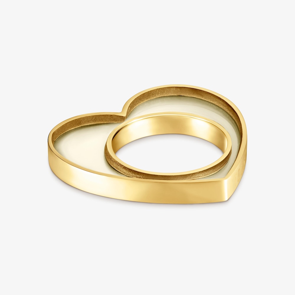 Anillo coraz&oacute;n de acero dorado y resina blanca Galaxy
