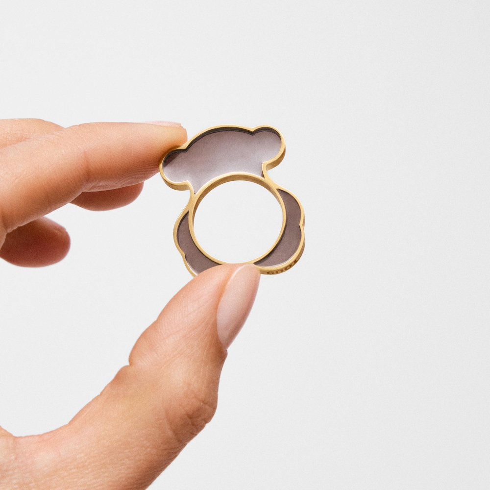 Pierścionek ze stali w kolorze złotym i czarnej żywicy z motywem misia TOUS Galaxy