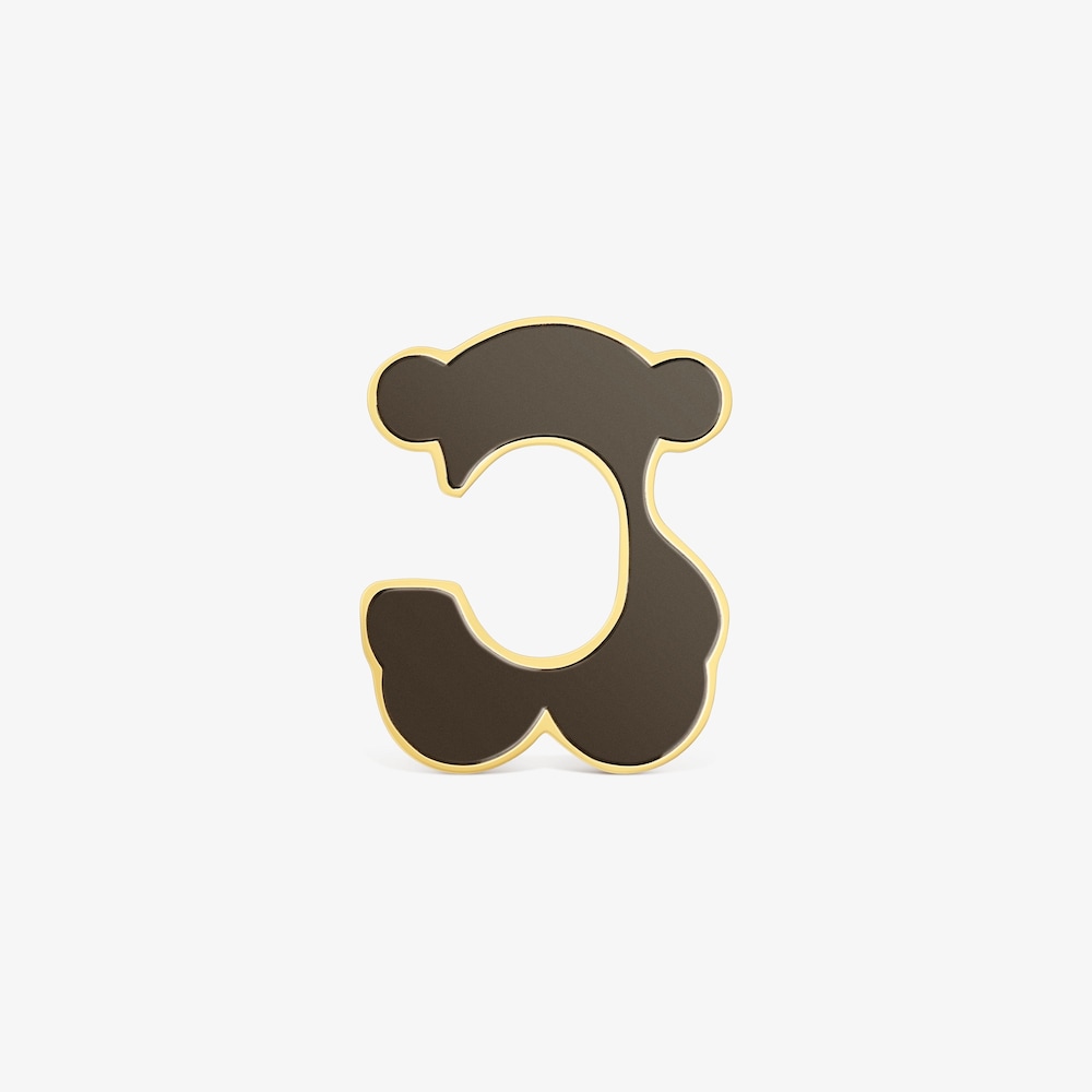 Z&aacute;u&scaron;nica s&nbsp;medved&iacute;kom z&nbsp;ocele zlatej farby a&nbsp;čiernej živice TOUS Galaxy