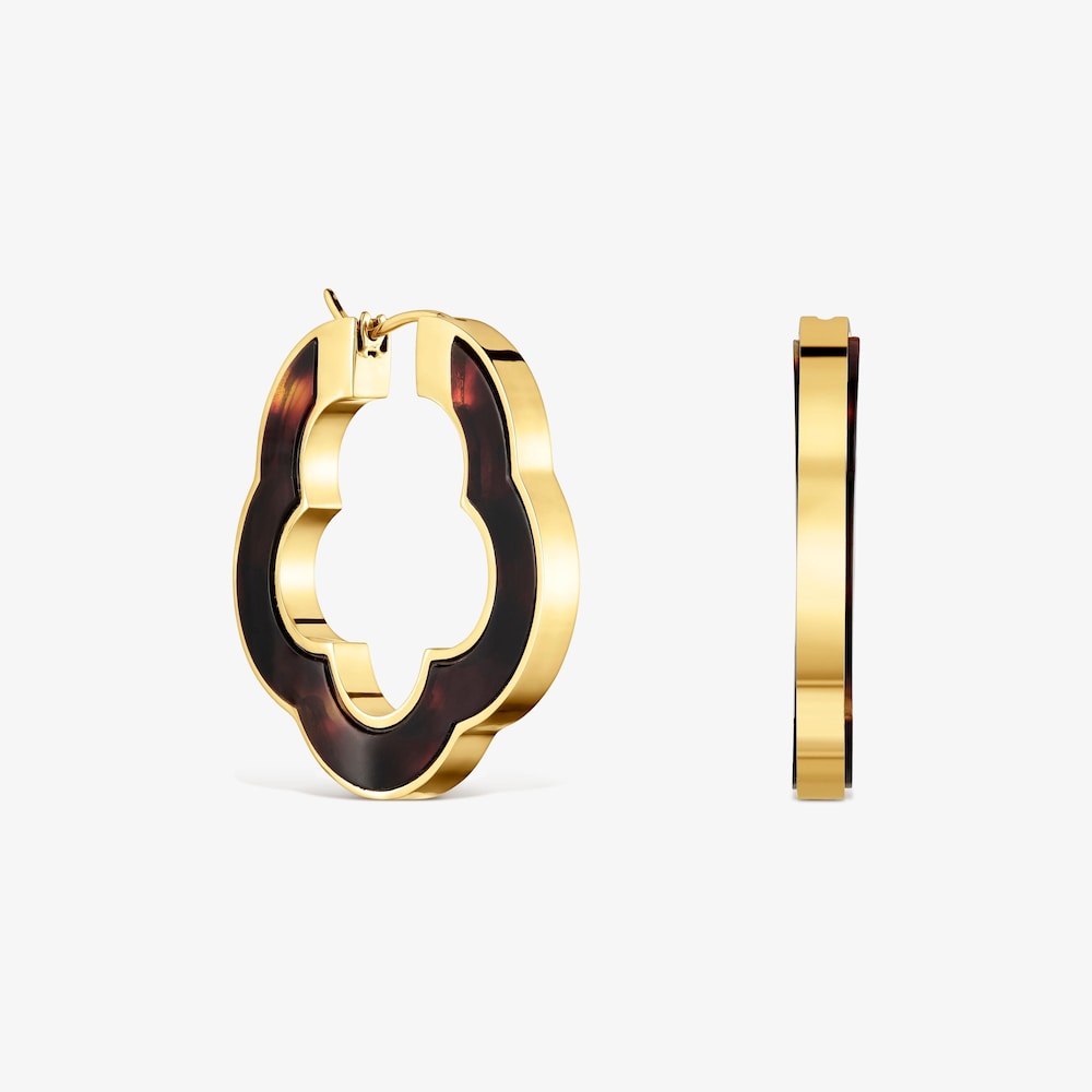 N&aacute;u&scaron;nice ve tvaru květiny o&nbsp;velikosti 33&nbsp;mm z&nbsp;oceli ve zlat&eacute; barvě a&nbsp;želvovinov&eacute; pryskyřice TOUS Galaxy